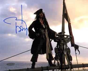 Johnny Depp Autographed Johnny Depp (Pirates of the Caribbean) Autographed Framed Display Johnny Depp (born June 9, 1963) is an American actor and musician known for his portrayals of offbeat,