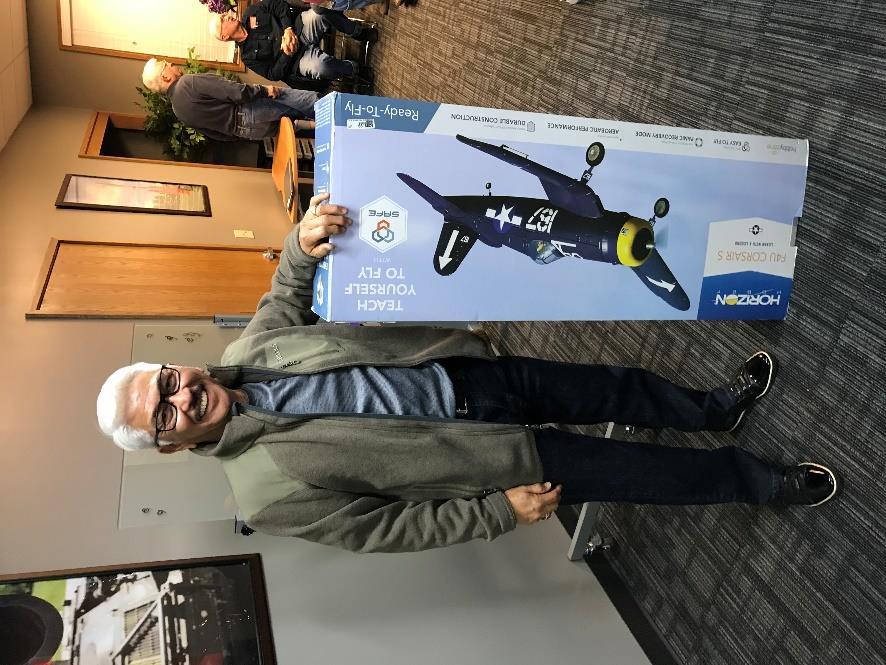 Unfortunately, the weather didn t cooperate and the warbird fun fly was a bust. Ray then suggested we raffle off the Corsair at the December club meeting. So who won the raffle you ask?