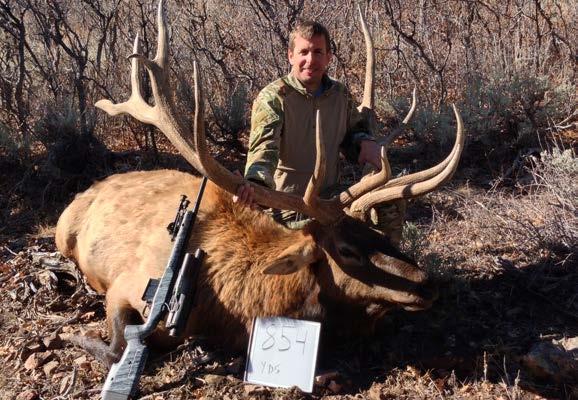Jason Schauble, President of TrackingPoint, shown with a 411-inch bull elk taken with one shot at 854 yards with a Barnes LRX