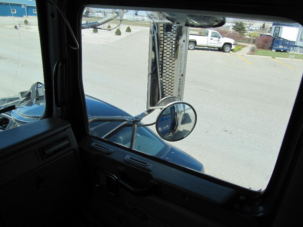 Importantly, the right mirrors of the truck in Figure 3 do not show the presence of the Buick.
