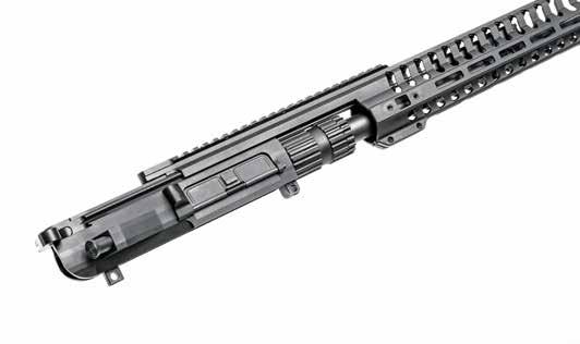 44 G&A August 2017 LEAN & MEAN The upper receiver slides into the handguard and forms one of the most stable unions of any AR-pattern rifle. The massive magazine well is beveled to help speed reloads.