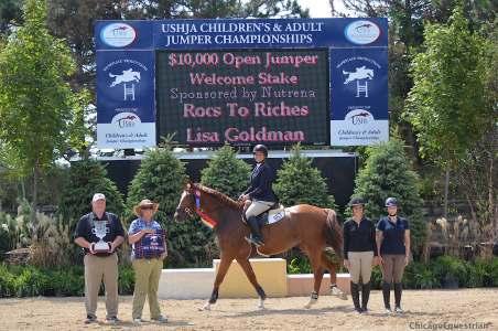 Page 2 of 8 Rocs to Riches and Lisa Goldman went to the top of the Showplace leader board in the $10,000 Open Welcome Stake at the Showplace Jumper Spectacular.