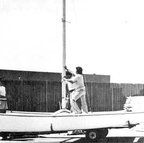 The second person can now let go of the mast and attach the forestay to the top of the stay adjuster which extends from the roller furler assembly. See Figure 18. Figure 20 10.