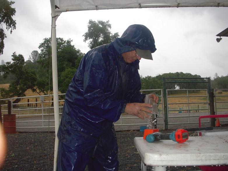 Members Work on Stormy Saturday to Prepare Arena for June Gymkhana Member Chris Hill in his rain