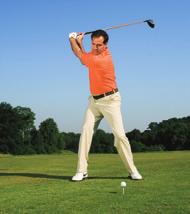 The center of your chest swings with the club, while your left knee begins to break toward your right knee and your body