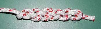 Daisy Chain Like the Braid Knot, this can be used as a decorative "pull" at the end of a rope or string, or as a "friendship braid," or as