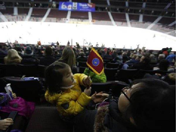 7-year-old Rhiannon watches her father play in the Imjin Classic, a hockey game between Princess Patricia s Canadian Light Infantry (PPCLI) and Royal 22e Régiment (R22R) to commemorate the 100th