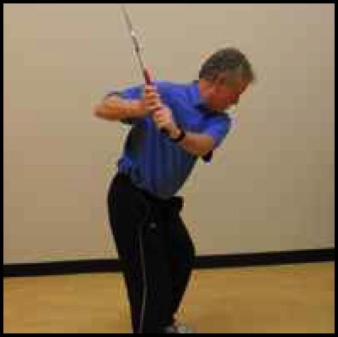 In addition, your right forearm should be in line with your torso, or primary spine angle, instead of an elbow up or chicken wing position.