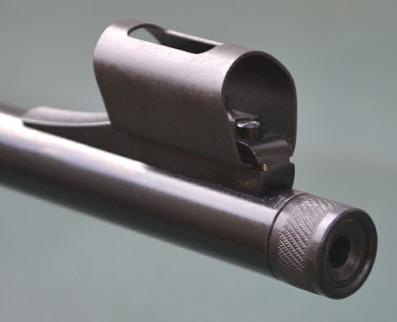 The bolt locks with the downward action of the bolt handle within the receiver and similarly, when opening the bolt the upward action provides the primary extraction.