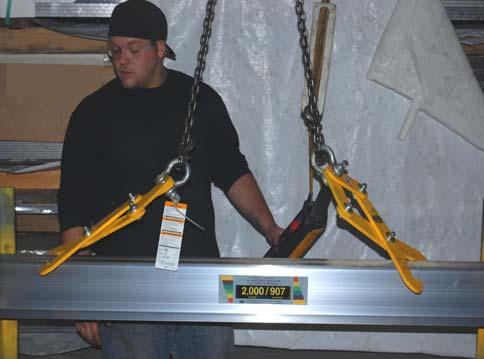 Step 6: If a single pair of tongs cannot balance the beam, use a combination of two or more tongs. In the pictures below, two sets of beam tongs are shown connected to a chain sling.