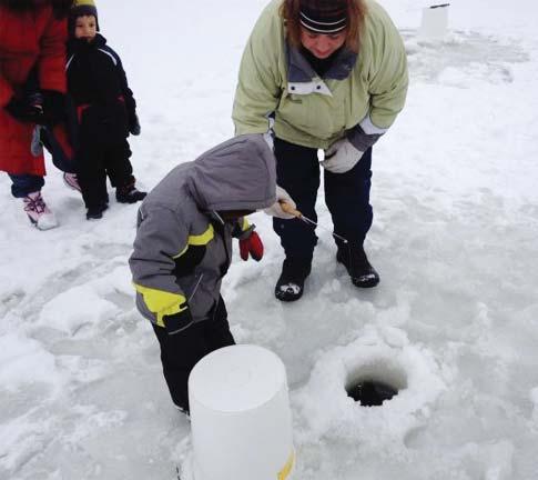 an auger to make a hole in the ice. They tie a hook to a fishing line. They put a worm or other bait on the hook and drop it through the hole.