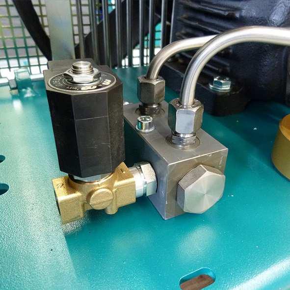 Tighten horizontal screw. Mount pneumatic condensate valve.