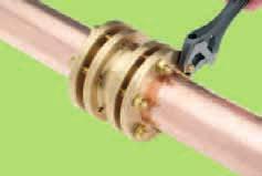Insert the tube firmly into the compression fitting, ensuring that the compression