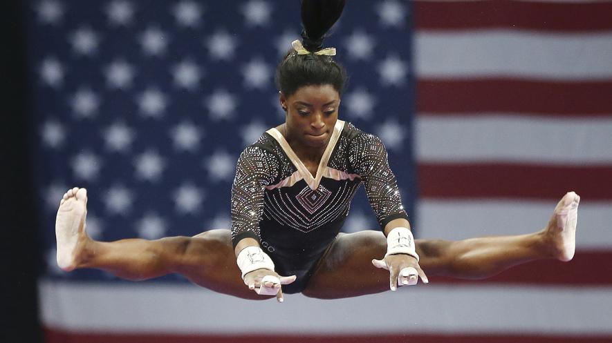 Athletes: Simone Biles By Biography.com, adapted by Newsela staff on 02.14.19 Word Count 952 Level 1140L Image 1. Simone Biles competes on the uneven bars at the U.S. Gymnastics Championships, Aug.