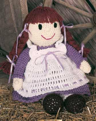 Pioneer Becky Doll By Sheila Leslie DIRECTIONS Beginner SIZE 17 inches tall MATERIALS Worsted weight yarn (8 oz per skein): 1 skein each white, light plum, off-white and rust, small amount of brown,