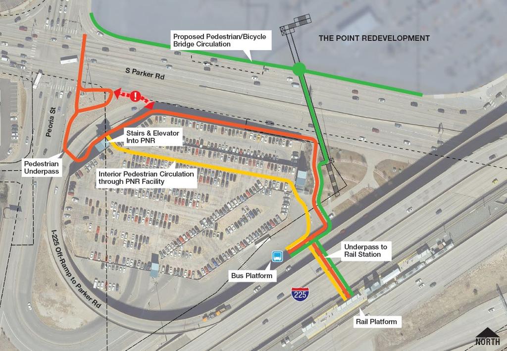2. Walk adjacent to the PNR structure and high-speed traffic on Parker Road (see darker orange line).