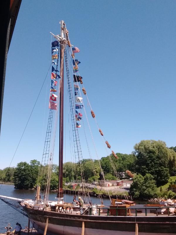 The sloop flew her flags on Flag Day.