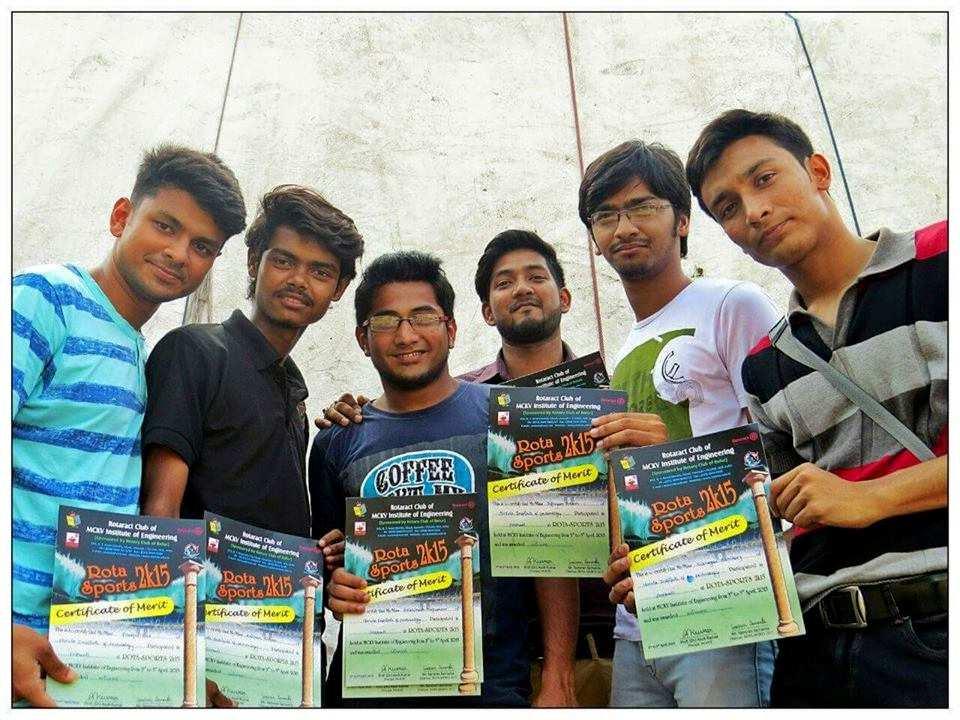 Football team of NIT poses with their championship certificates after winning Inter College Football