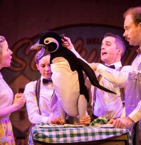 I will listen to Mr. and Mrs. Popper sing to the penguin to try to teach him manners.