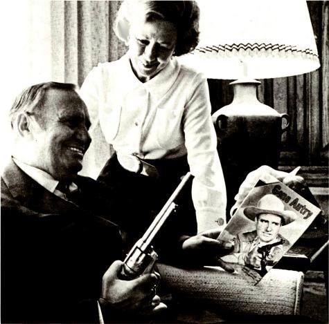 GOOD GUYS IN WHITE HATS FINISH FIRST Gene Autry: Cowboy Horatio Alger With a Midas Touch in Business SOUVENIRS -Gene Autry and wife. Ina, look over some mementos.