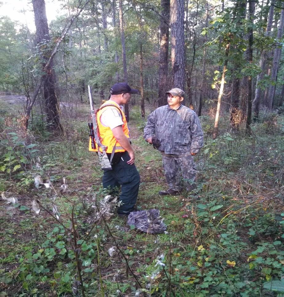 Page and Kendrick discovered a large bait pile consisting of peanuts and apples. This hunter was also charged with hunting big game over bait and warned for hunting without wearing an orange vest.