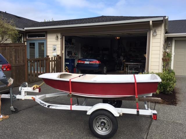 8' FIBERCLASS SABOT SAILING DINGHY built by Clark Boats, Auburn. Accessories include mast, boom, Dacron sail, center board rudder and oars. Trailer not included.