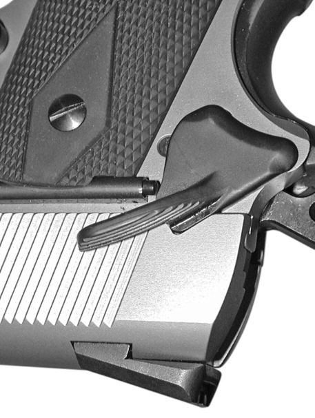 Depress the magazine release, and remove the magazine. Place the safety lever into the down fire position (FIGURE 19).