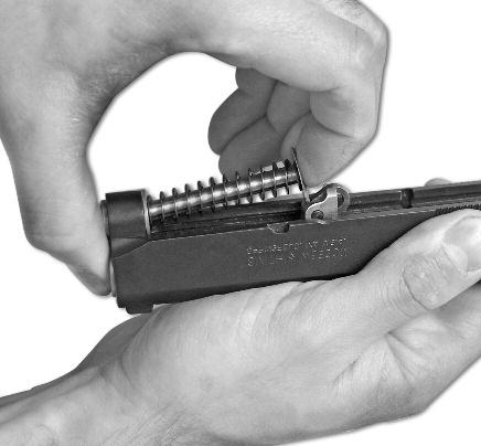 Remove the guide rod and recoil spring from under the barrel (FIGURE 37). FIGURE 36 FIGURE 37 WARNING: DO NOT DRY FIRE YOUR SW1911 AND SW1911 E-SERIES SERIES PISTOL WHILE THE SLIDE IS REMOVED.