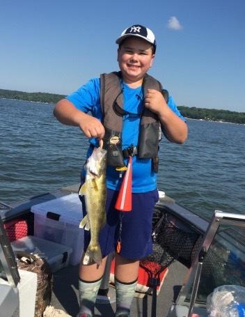 Isaac, age 10, using a TX-007 to catch his first ever fish Luke, age 5, catching a fish with a TX-005 and a Snoopy Pole Stern Planer Tactics In Wisconsin, 3 lines are allowed per angler, so when
