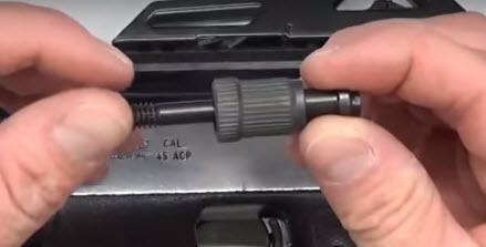 Step 5: Pull back on the rail lock to remove the