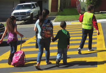 INTRODUCTION Walking School Buses help families save time and money while having fun and meeting neighbors.