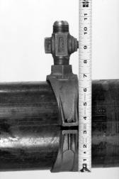 Figure 6 Measuring Full Stroke Distance 3. Measure the distance from the surface of the pipe to the outlet end of the valve as shown in Figure 7.