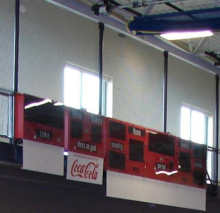 Divider Curtain (when down) And Scoreboard/ Track Net The ceiling/backboards are