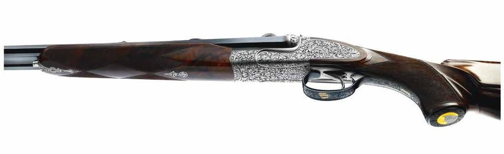 Fine English style bouquet or semi relief engraving. Pistol grip stock with cheek piece, hand checkered 5 stars walnut.