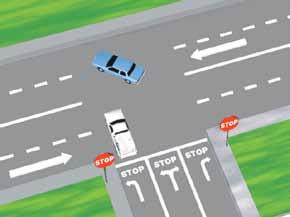 Watch for pedestrians, motorcyclists, and bicyclists between your vehicle and the curb because they can legally use the left turn lane for their left turns.