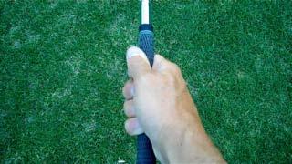 3. The V in your right hand points to your right shoulder. You now have two options when connecting the fingers the overlap or interlock grip. Either grip works perfectly well.