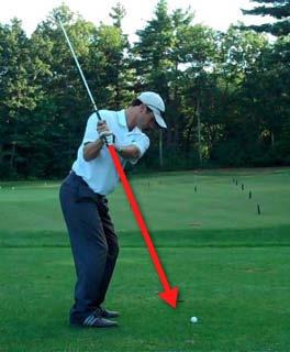 The following is a critical position of the half swing. When your left arm is parallel to the ground, at the 9:00 position, the butt end of the club must never extend outside the target line.