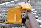 Wheels naturally hug the outer rail as they round into the curve, and thus are more likely to climb over the rail and down to the ballast.