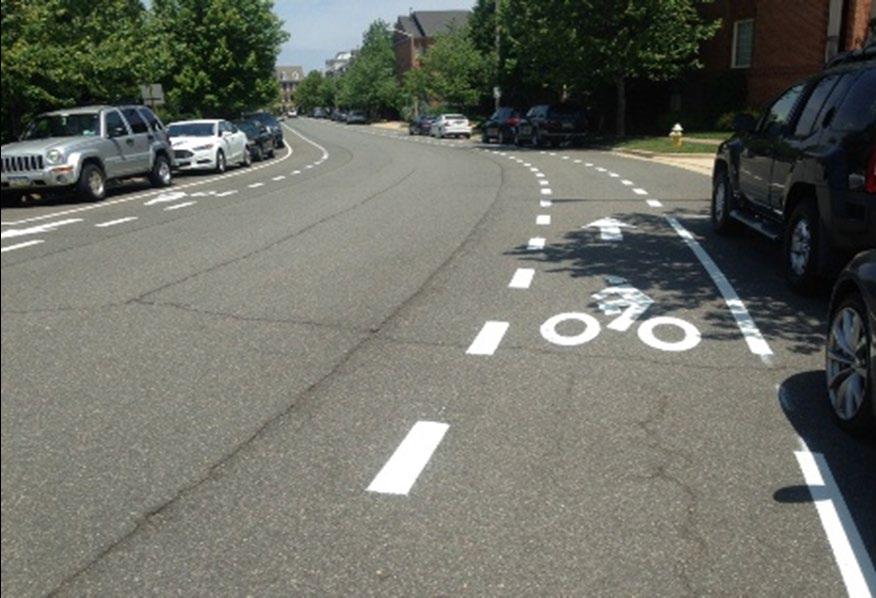 Arlington County also uses green paint or markings at critical locations where bicycle lanes and drive lanes cross each other in unusual configurations, such as at "Y" intersections or at the start