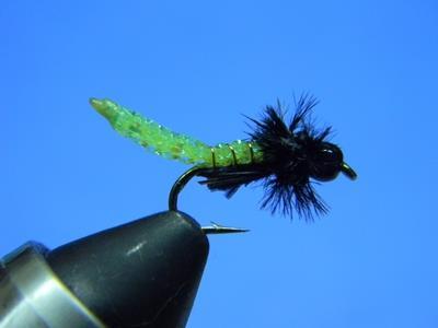 Note: If you want a tighter, less fluffy hackle, substitute with peacock herl.