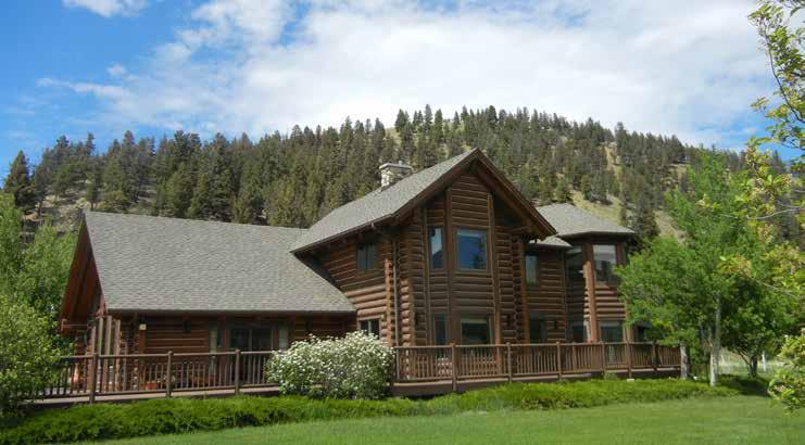 Improvements: This immaculate 4,987 sqft log home is ideal for year round living or as a second home with plenty of