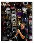 Costumania owner Mark Young holds a mask of Anubis, Egyptian god of the underworld, in front of the masquerade mask wall, which displays hundreds of
