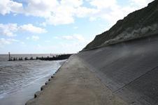 Hard engineering solutions Type of defence Pros and cons Building a sea wall A wall built on the edge of the coastline Advantages Protects the base of cliffs, land and buildings against erosion.