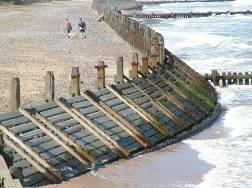 Advantages - Easily installed, cheaper than sea wall Disadvantages - Not very attractive, needs frequent checking & repair, not easy for people to get over to get to