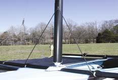 To get started, place a knot in this line, which allows the mast to rotate +/-45 degrees. A jib sheet guide bungee is provided through a pad eye on the front of the mast.