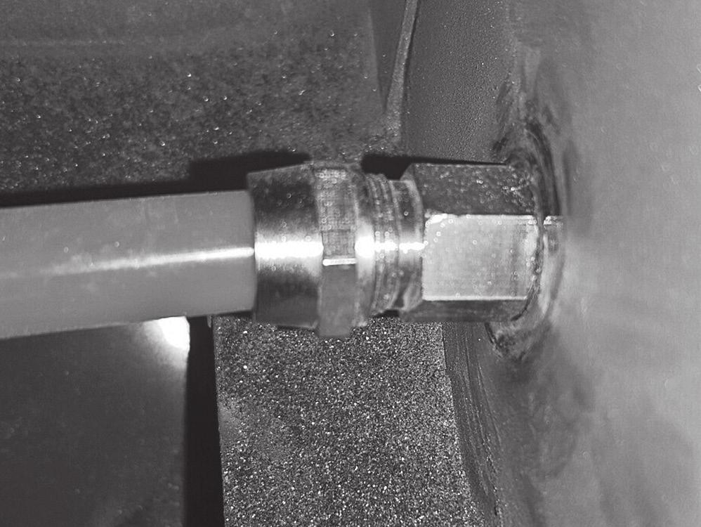 Tighten Ferrule with Hose onto the Bulkhead Fitting (FIG 4).