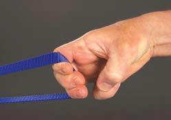 At this stage, adjust the Form Strap to the correct draw length for each student (photo below). Place the Form Strap along the inside of the life line on the thumb pad of the bow hand.