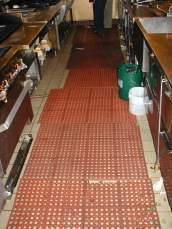 Skid-resistant, anti-fatigue mats in kitchen