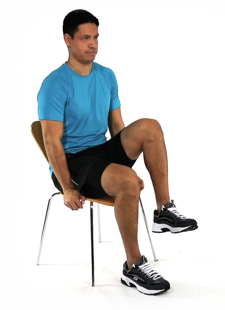 CHAIR KNEE LIFTS Sit tall in a chair, holding its arms or seat. Pull your belly button in toward your spine.