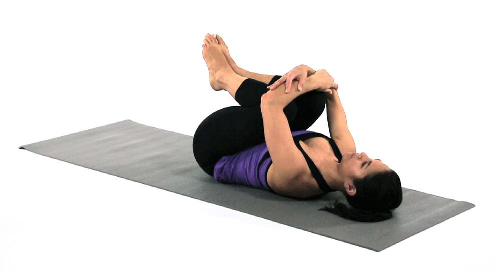 Repeat 20 to 30 times, doing more KNEE TO CHEST HUG Draw your knees into your chest. Wrap arms around knees and hug.
